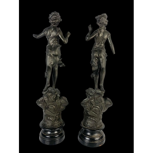 45 - A pair of large late 19th century spelter figures and another late 19th century spelter figure. Pair... 