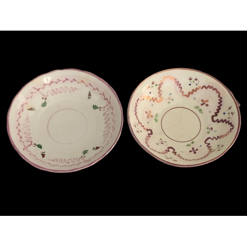 454 - 9 pieces of early 19th century purple lustre ware. 8 saucers and a cup. Circa 1810.