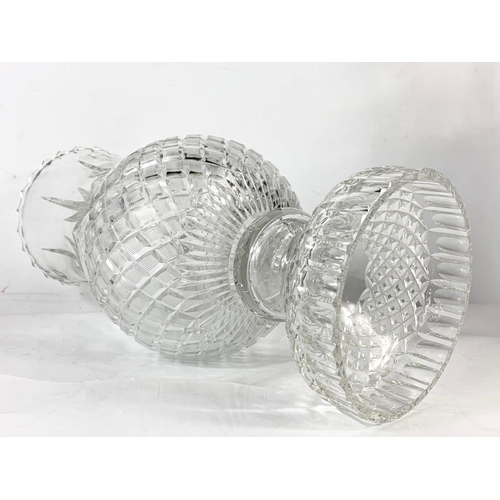 487 - A pair of very large Waterford crystal vases. 51cm tall. 23cm wide.