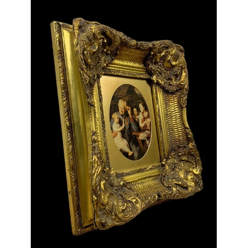 49 - An ornate gilt framed print. From Carvers & Gilders Picture Makers & Restorers. 39 x 44cm.