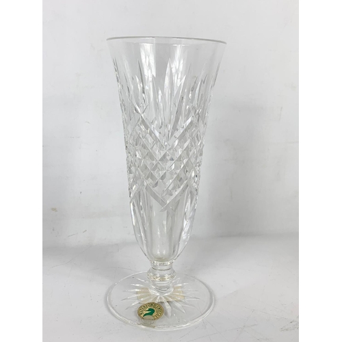 497 - 2 Waterford crystal vases. 23.5cm.