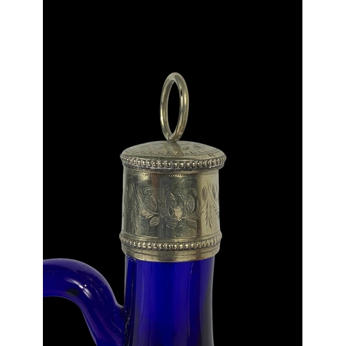 502 - 2 Victorian Bristol Blue and Amber glass decanter/flagons on a silver plated stand by Mappin & Webb.... 