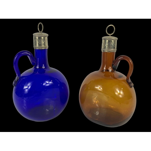 502 - 2 Victorian Bristol Blue and Amber glass decanter/flagons on a silver plated stand by Mappin & Webb.... 