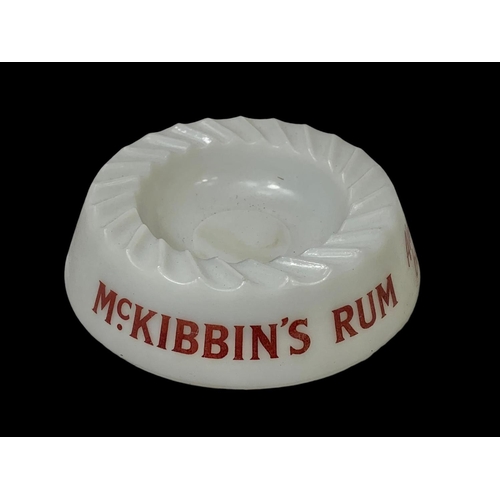 538 - A vintage McKibbin’s Rum glass ashtray.