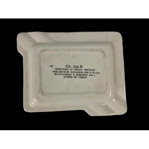 563 - A vintage Guinness pottery ashtray. GA. 562 B. Produced in Great Britain for Arthur Guinness Son & C... 