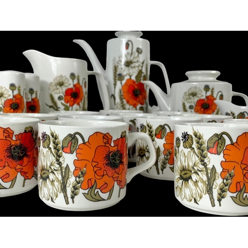 565 - A 22 piece JG Meakin Studio part tea and coffee set.