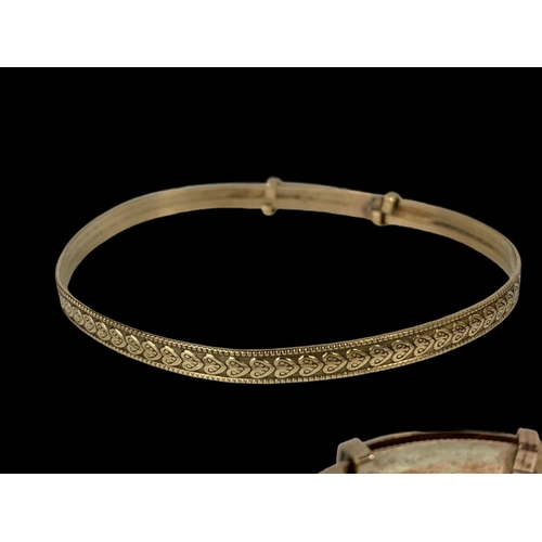 661 - 8 rolled gold bangles