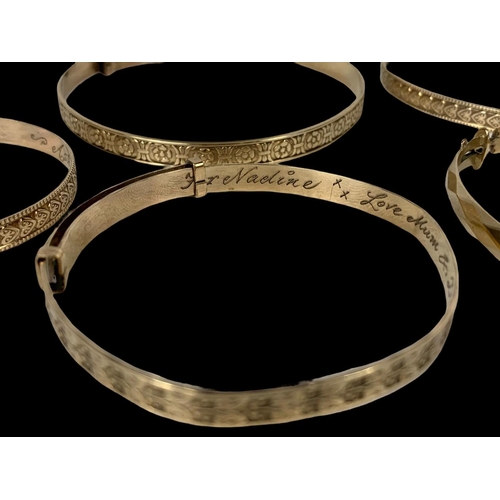 661 - 8 rolled gold bangles