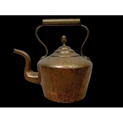 68 - A large Victorian copper kettle. 36 x 34cm.