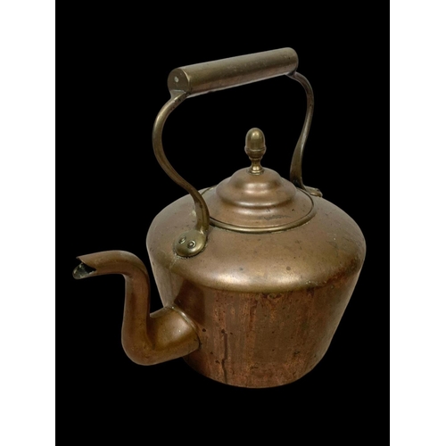 68 - A large Victorian copper kettle. 36 x 34cm.