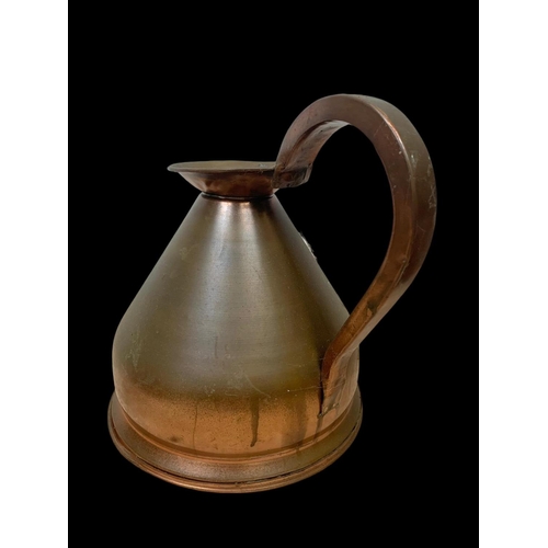 69 - A set of 3 Victorian copper jugs. 25 x 25cm.