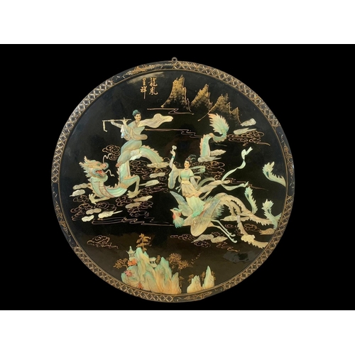 71 - A large vintage oriental lacquered wall plaque. 89.5cm.