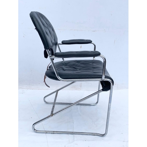 812 - A Swedish leather and chrome “Sam” desk chair designed by Sam Larsson for DUX. Mid century Sweden. C... 