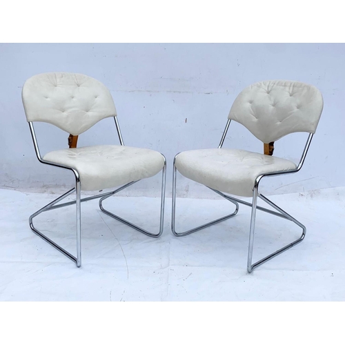 813 - A pair of Swedish leather and chrome “Sam” chairs designed by Sam Larsson for DUX. Mid century Swede... 