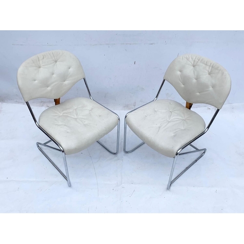 813 - A pair of Swedish leather and chrome “Sam” chairs designed by Sam Larsson for DUX. Mid century Swede... 