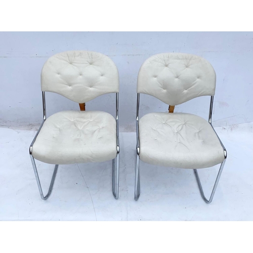 813 - A pair of Swedish leather and chrome “Sam” chairs designed by Sam Larsson for DUX. Mid century Swede... 