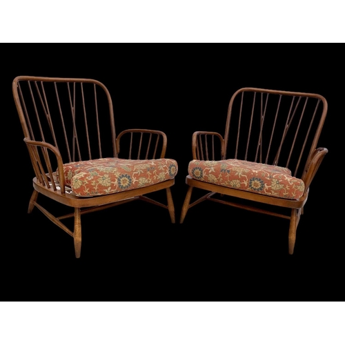 820 - A pair of Ercol Golden Dawn Windsor “Jubilee” armchairs. Mid century. Circa 1960’s. 81 x 94 x 83cm.