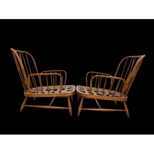 820 - A pair of Ercol Golden Dawn Windsor “Jubilee” armchairs. Mid century. Circa 1960’s. 81 x 94 x 83cm.