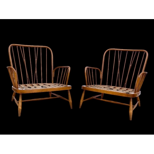 820 - A pair of Ercol Golden Dawn Windsor “Jubilee” armchairs. Mid century. Circa 1960’s. 81 x 94 x 83cm.