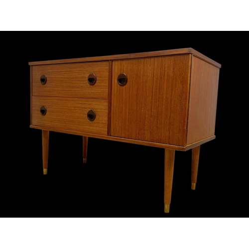 845 - A small teak sideboard with 2 drawers and cupboard. Circa 1970. 91.5 x 42.5 x 62.5cm