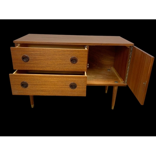 845 - A small teak sideboard with 2 drawers and cupboard. Circa 1970. 91.5 x 42.5 x 62.5cm