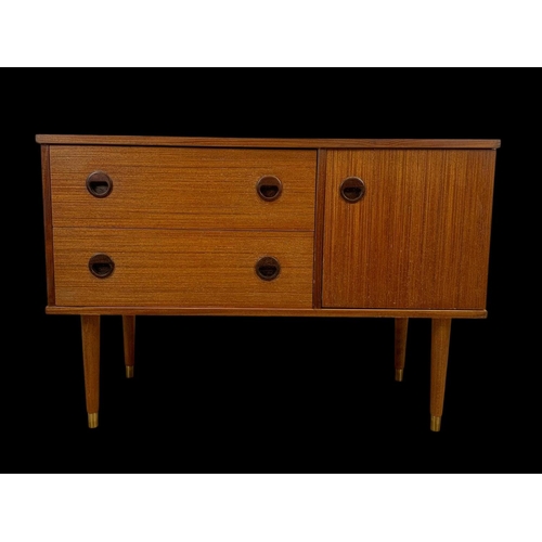 845 - A small teak sideboard with 2 drawers and cupboard. Circa 1970. 91.5 x 42.5 x 62.5cm