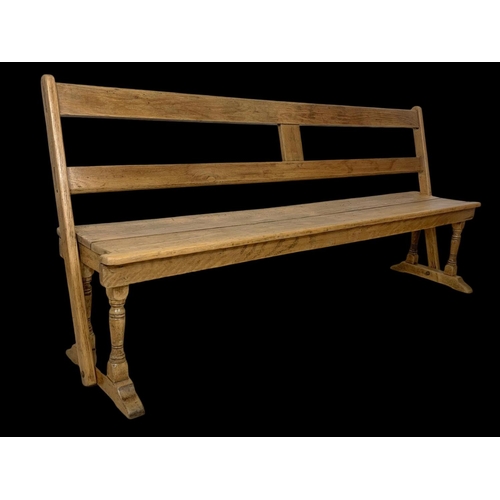 853 - A late 19th century pine reversible railway bench. 183cm.