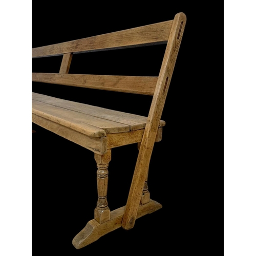 853 - A late 19th century pine reversible railway bench. 183cm.