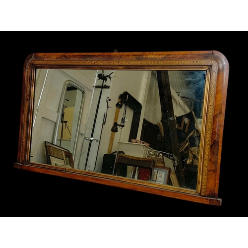 854 - A late 19th century inlaid over-mantle mirror. Circa 1880. 100 x 57cm.