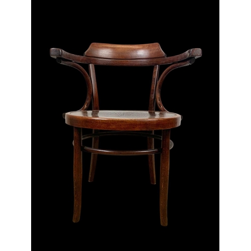 859 - A vintage bentwood armchair. 64 x 50 x 78cm.