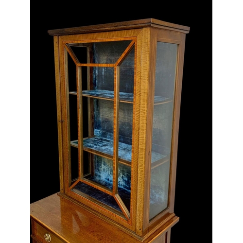 861 - An Edwardian inlaid display cabinet. With original blue velvet interior. 53 x 39.5 x 161cm.