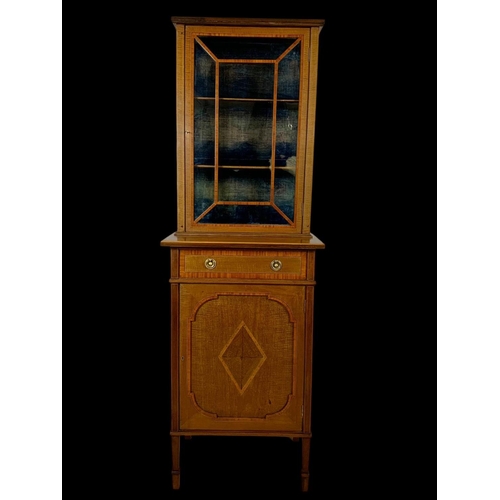 861 - An Edwardian inlaid display cabinet. With original blue velvet interior. 53 x 39.5 x 161cm.