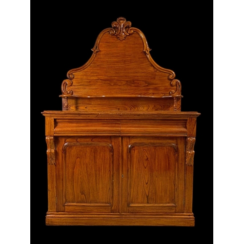 863 - A Victorian style elm chiffonier. With craved gallery, 2 drawers and a 2 drawer cupboard. 122 x 52 x... 