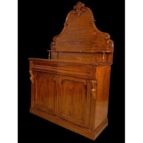 863 - A Victorian style elm chiffonier. With craved gallery, 2 drawers and a 2 drawer cupboard. 122 x 52 x... 