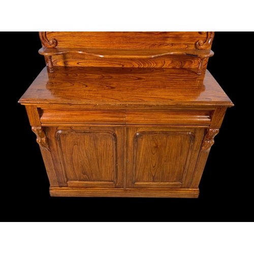 863 - A Victorian style elm chiffonier. With craved gallery, 2 drawers and a 2 drawer cupboard. 122 x 52 x... 