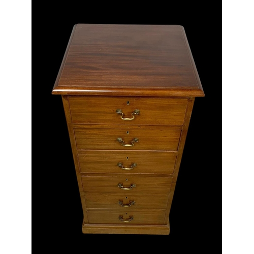 865 - A tall Edwardian mahogany office chest of drawers with brass drop handles. Stamped O’Connell Cork. 5... 