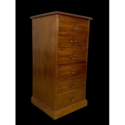 865 - A tall Edwardian mahogany office chest of drawers with brass drop handles. Stamped O’Connell Cork. 5... 