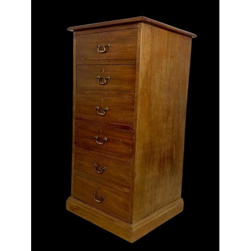 865 - A tall Edwardian mahogany office chest of drawers with brass drop handles. Stamped O’Connell Cork. 5... 