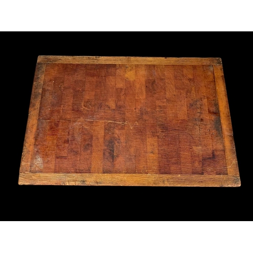 873 - A large butcher block on stand. 91.5 x 62 x 90.5cm