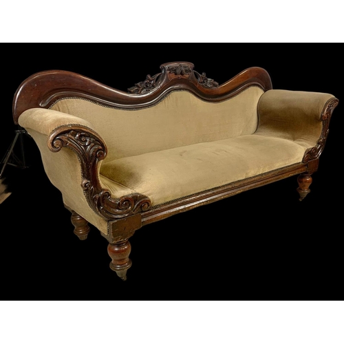 875 - A Victorian carved mahogany double end couch. Circa 1870. 207cm