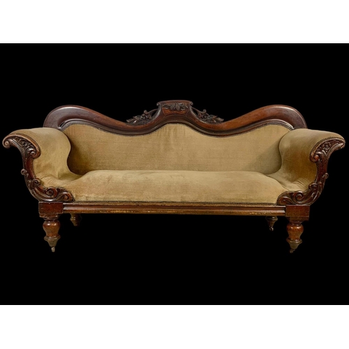 875 - A Victorian carved mahogany double end couch. Circa 1870. 207cm