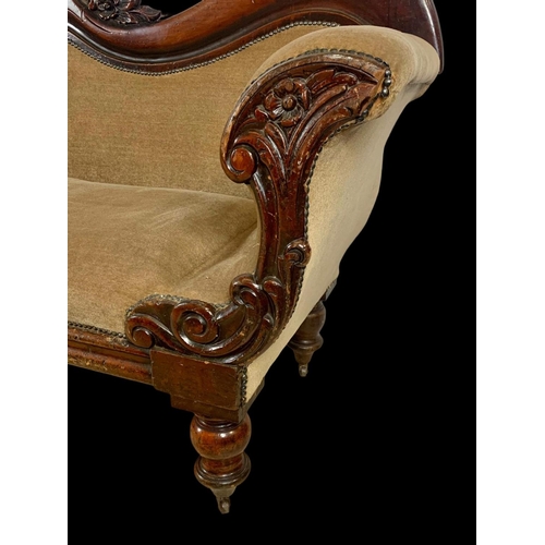 875 - A Victorian carved mahogany double end couch. Circa 1870. 207cm