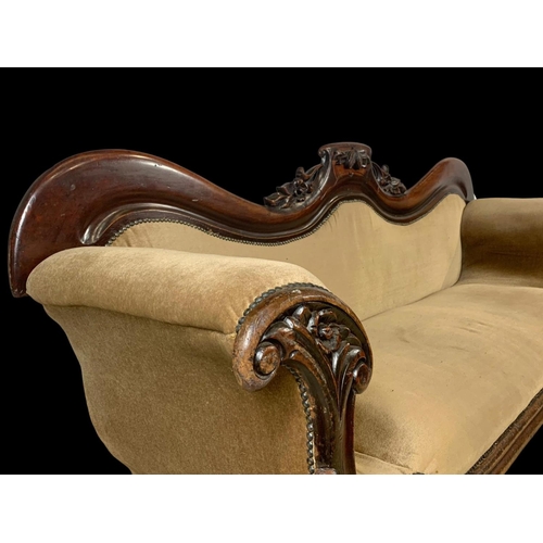 875 - A Victorian carved mahogany double end couch. Circa 1870. 207cm