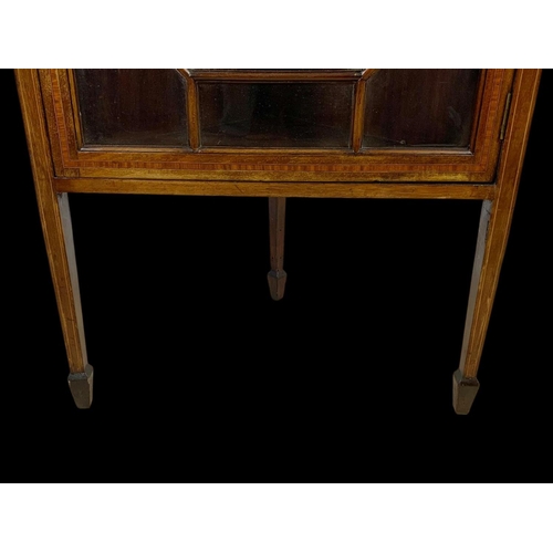 876 - An Edwardian inlaid corner display cabinet. 61 x 38.5 x 150cm