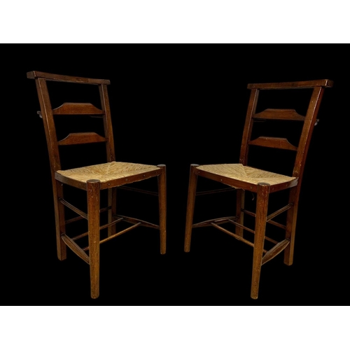 879 - A set of 6 early 20th century church chairs with rush seats. Circa 1920.