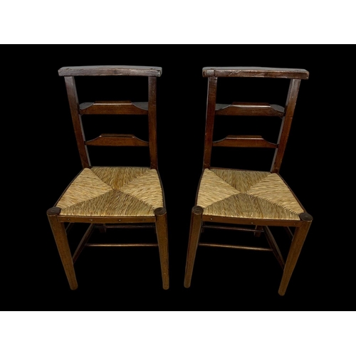 879 - A set of 6 early 20th century church chairs with rush seats. Circa 1920.