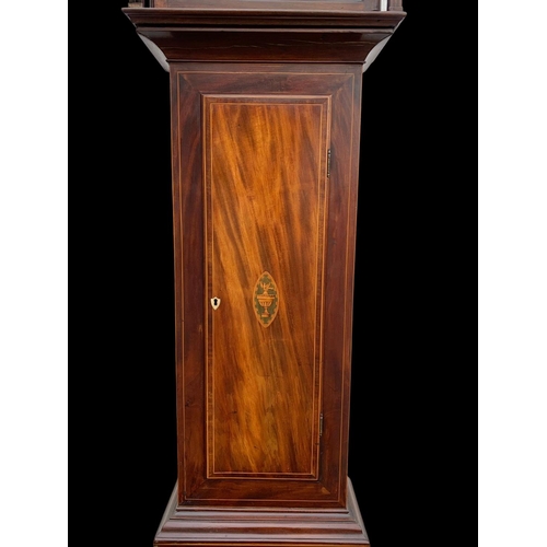 882 - A late Georgian inlaid mahogany long case clock, with brass face. Circa 1820. With weights and pendu... 