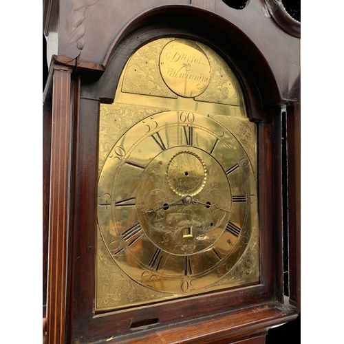 882 - A late Georgian inlaid mahogany long case clock, with brass face. Circa 1820. With weights and pendu... 