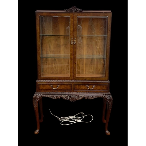 883 - A vintage carved walnut display cabinet. In the Georgian style. Circa 1950.  99 x 42 x 159.5cm