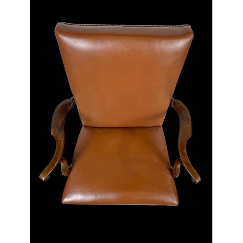 896 - A Georgian mahogany armchair with leather back and seat. Circa 1780-1800. 65 x 105cm.